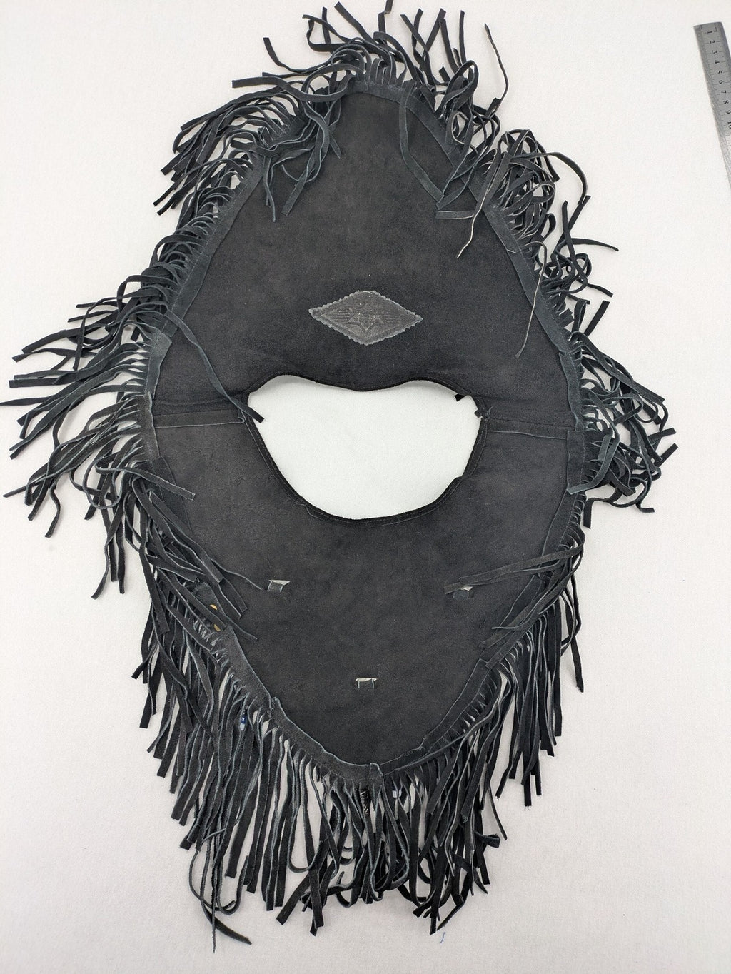 Stars & Stripes black suede fringe vest with silver conchos and beaded tassels.