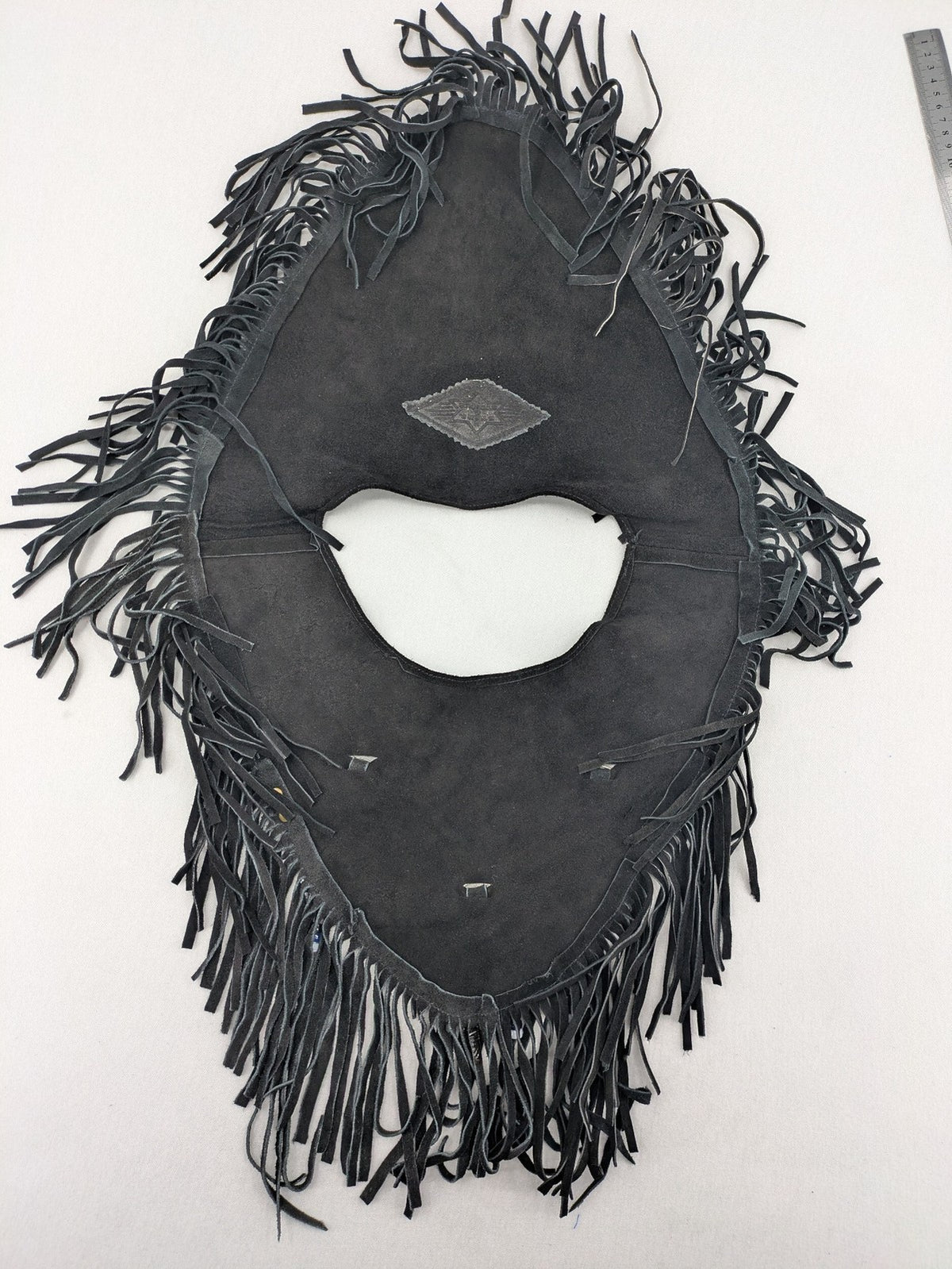 Stars & Stripes black suede fringe vest with silver conchos and beaded tassels.