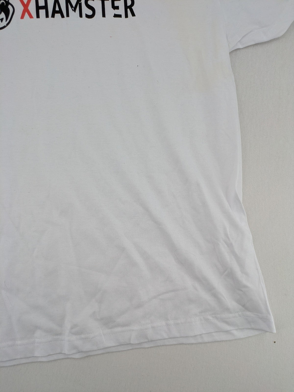 Xhamster white graphic t-shirt printed logo on chest, short sleeves, round neck.