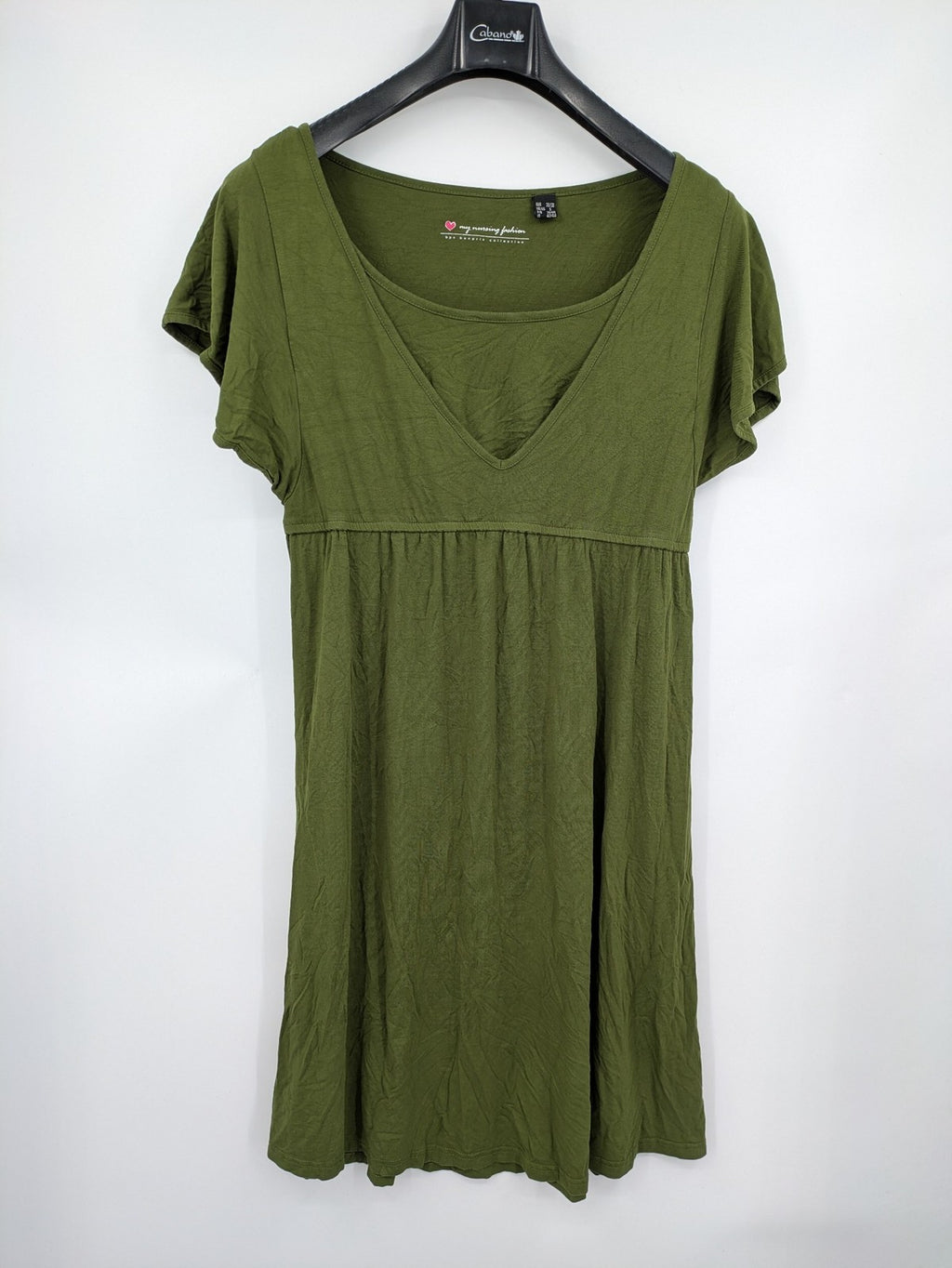 Bonprix green maternity dress with layered V-neck and empire waist design.
