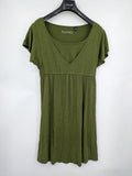 Bonprix green maternity dress with layered V-neck and empire waist design.