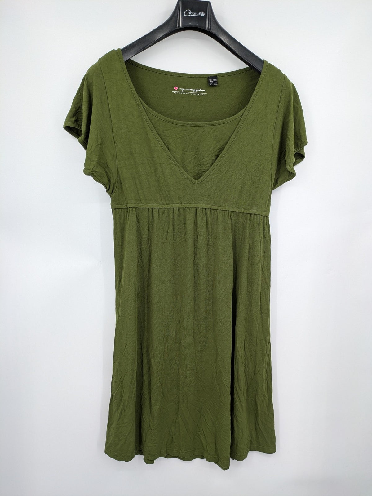 Bonprix green maternity dress with layered V-neck and empire waist design.