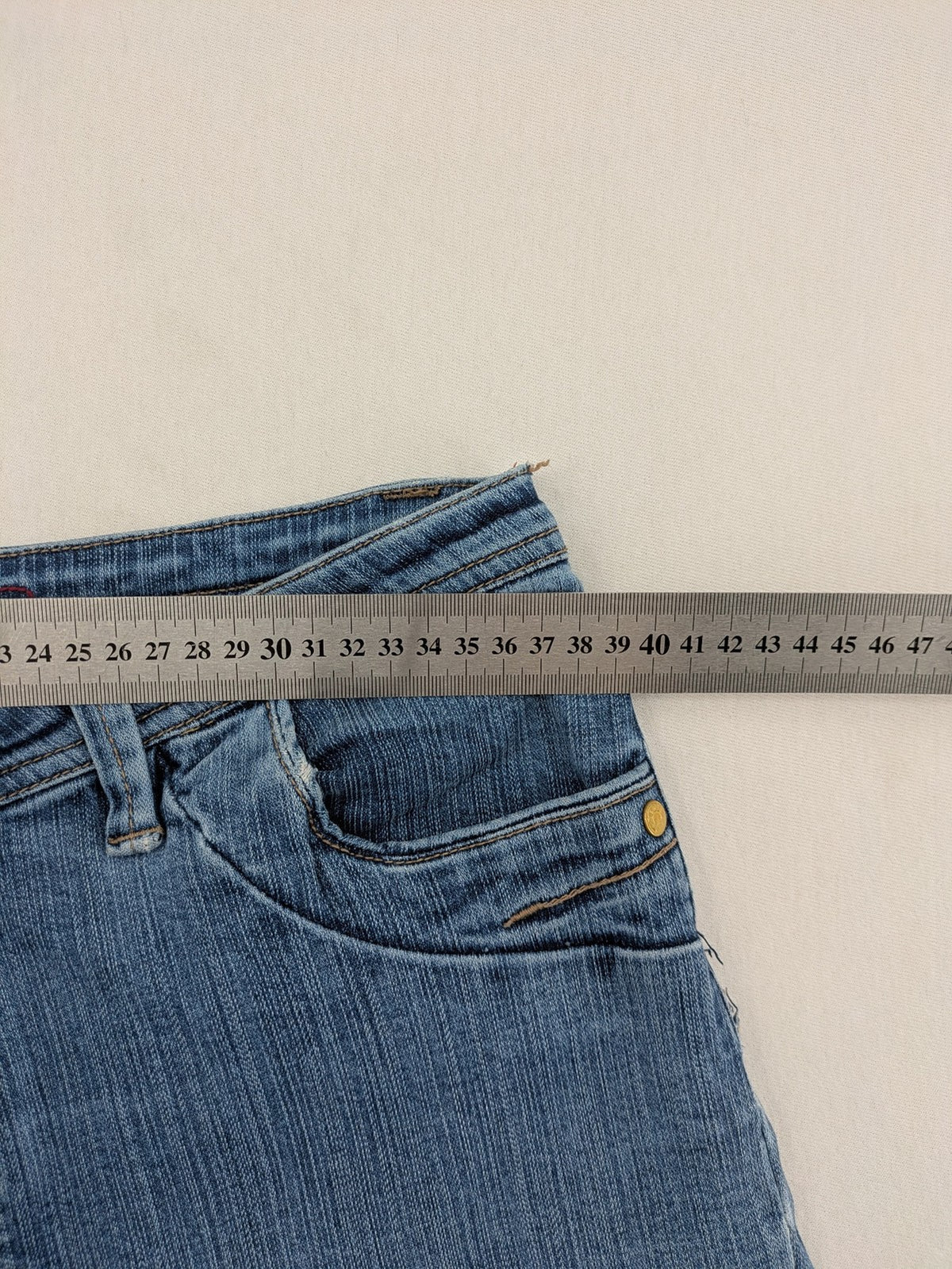 Vunic blue bootcut jeans medium wash five-pocket style with zipper and button closure