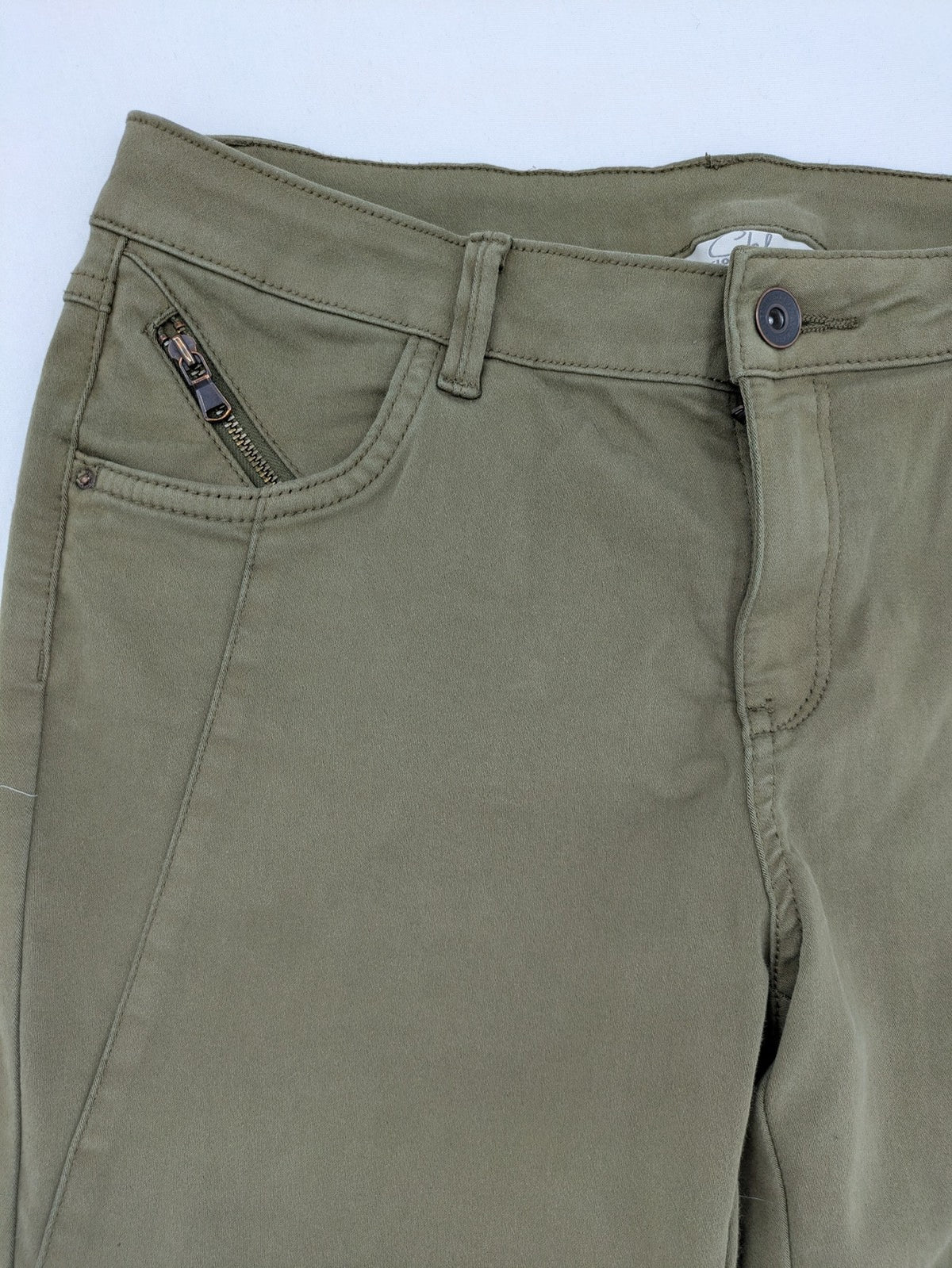 Clockhouse green moto jeggings with ribbed knee panels and ankle zippers.