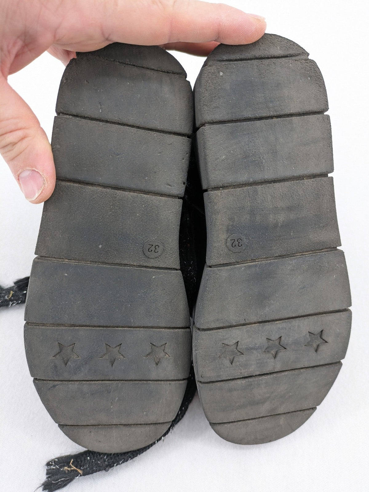 Graceland black combat boots with front lacing and chunky platform sole.