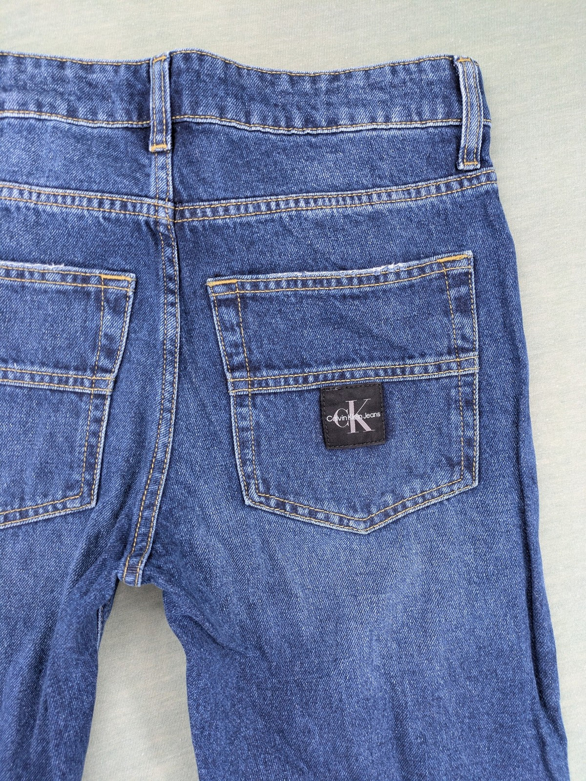 Calvin Klein Jeans blue straight jeans classic five-pocket design adjustable waistband 100% cotton