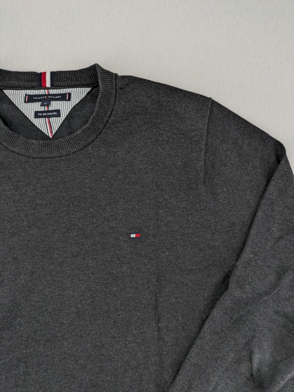 Tommy Hilfiger grey turtle neck jumper with embroidered flag logo on chest.