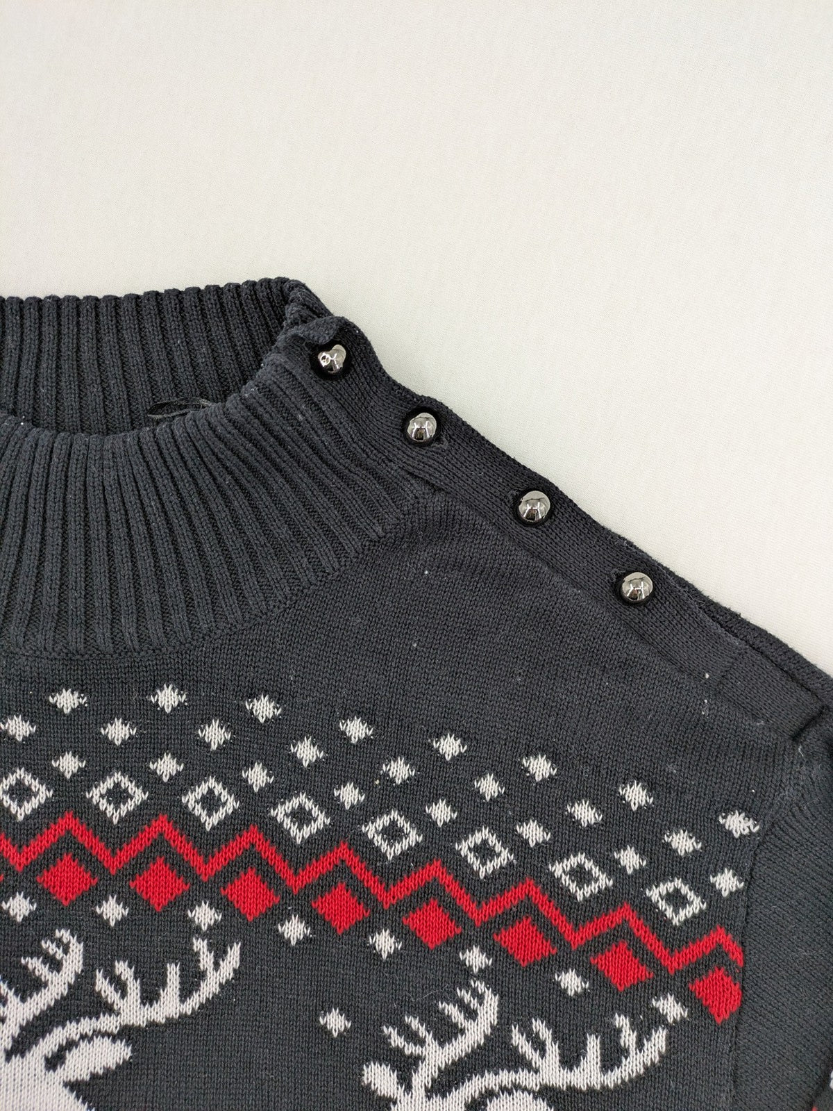 BPC Bonprix grey red white turtle neck jumper with reindeer Fair-Isle pattern and decorative buttons.