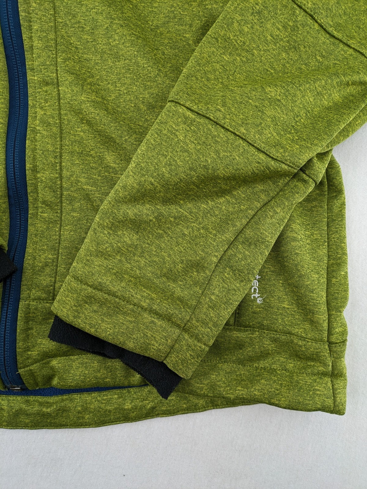 CMP outdoor coat blue and green with fleece lining, zip closure, and hood.