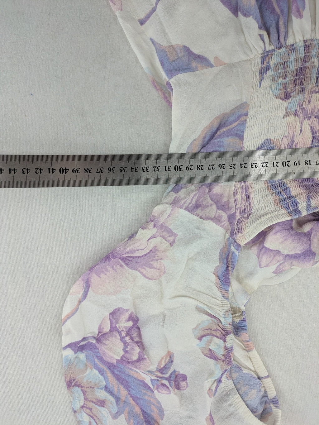 Forever 21 women's midi dress white with blue and purple floral pattern, smocked bodice, puff sleeves.