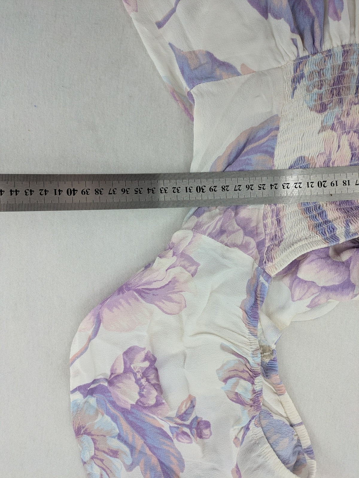 Forever 21 women's midi dress white with blue and purple floral pattern, smocked bodice, puff sleeves.