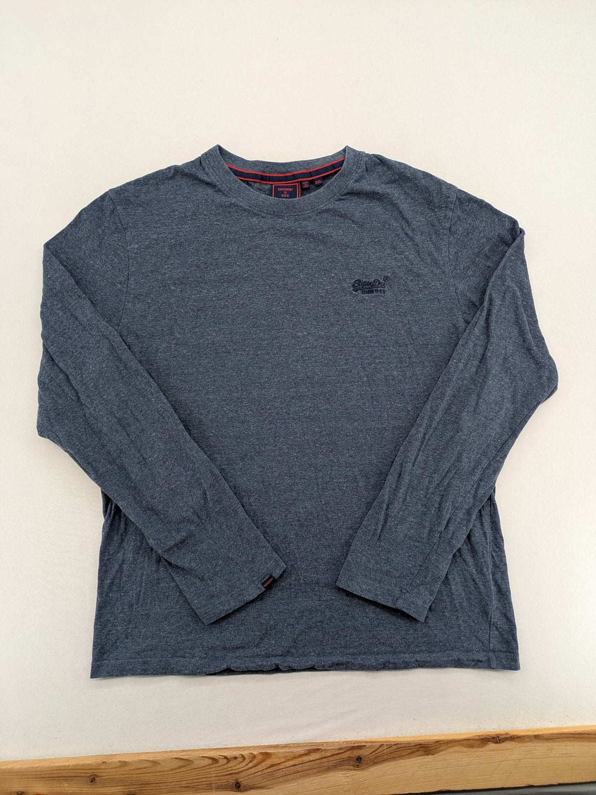 Superdry grey long sleeve shirt melange with embroidered logo and red collar accent.