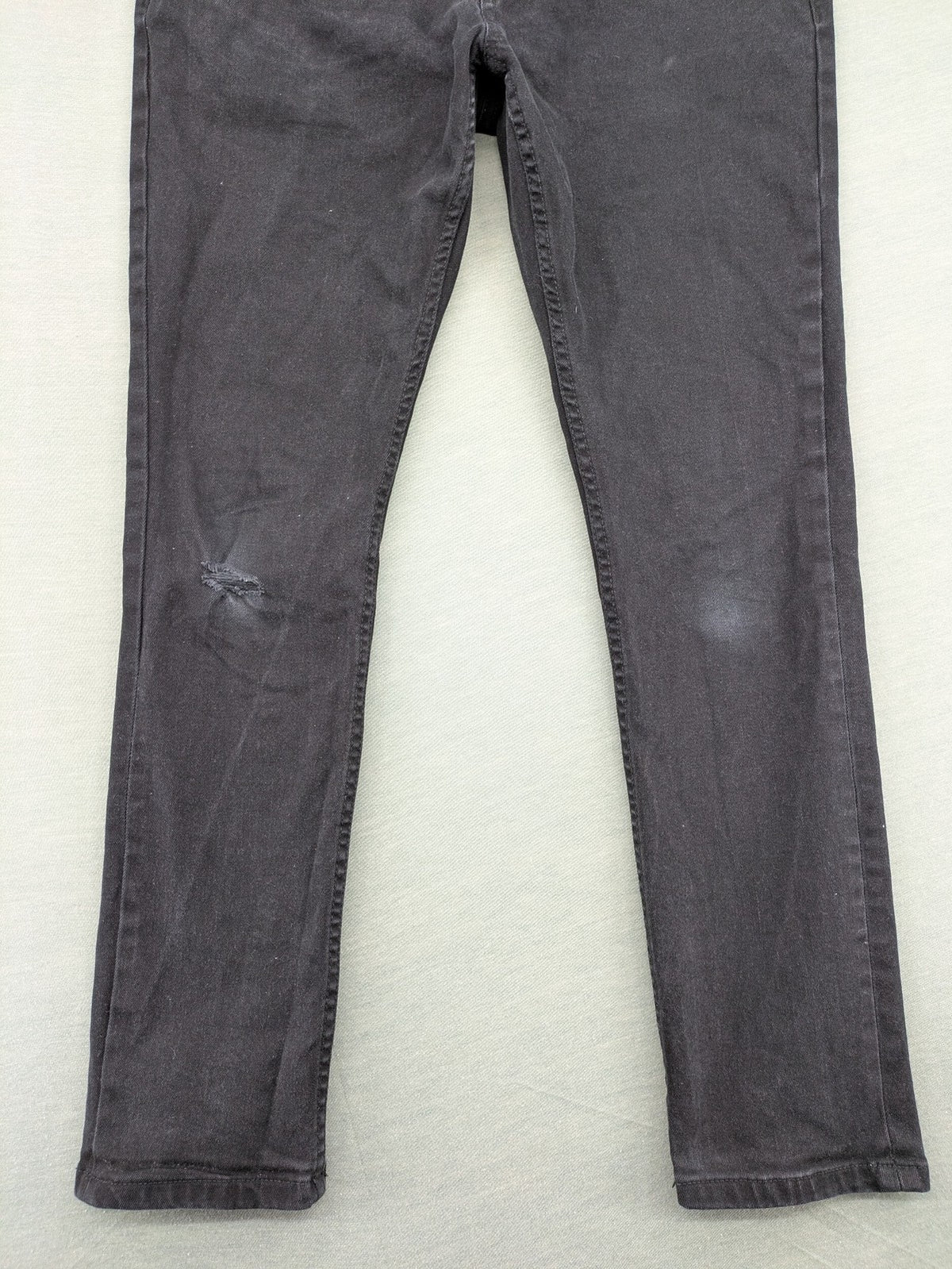 Denim & Co. grey slim fit jeans with button fly and classic 5-pocket design.