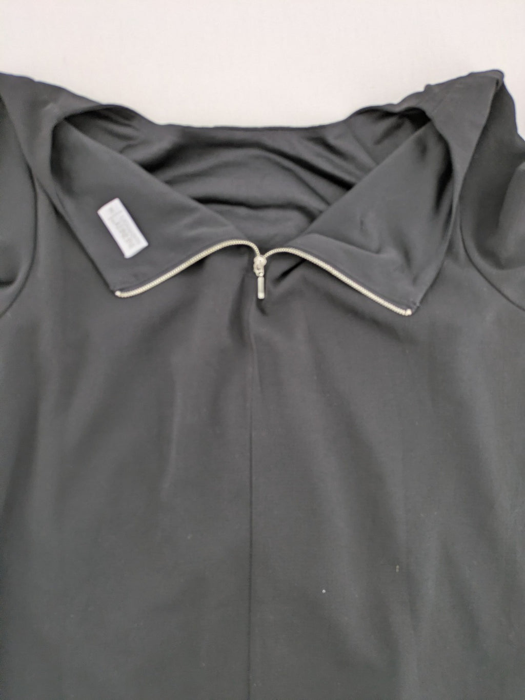 Infinity grey bridal party dress with pleated front and 3/4 sleeves.