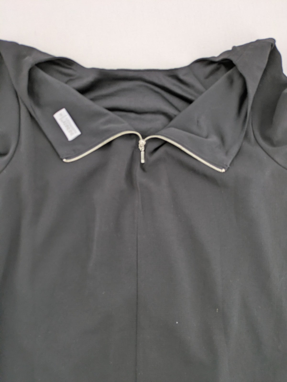 Infinity grey bridal party dress with pleated front and 3/4 sleeves.