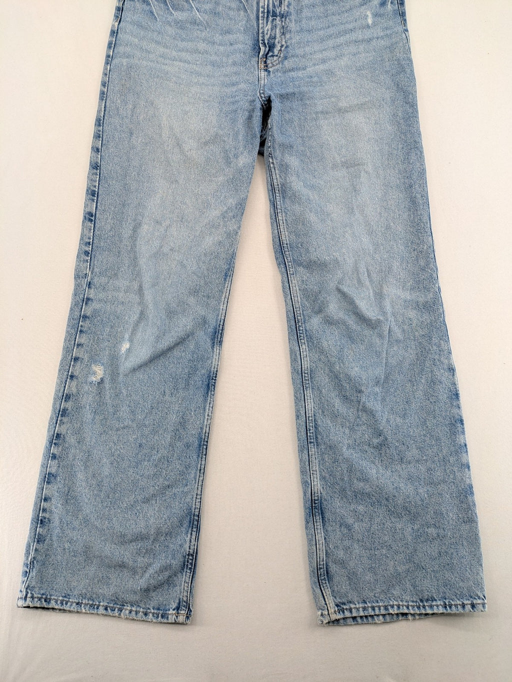 H&M blue wide leg jeans with distressed details and high waist, 100% cotton.