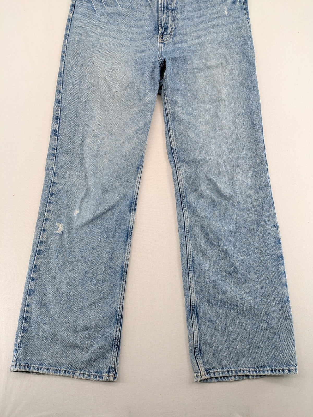 H&M blue wide leg jeans with distressed details and high waist, 100% cotton.