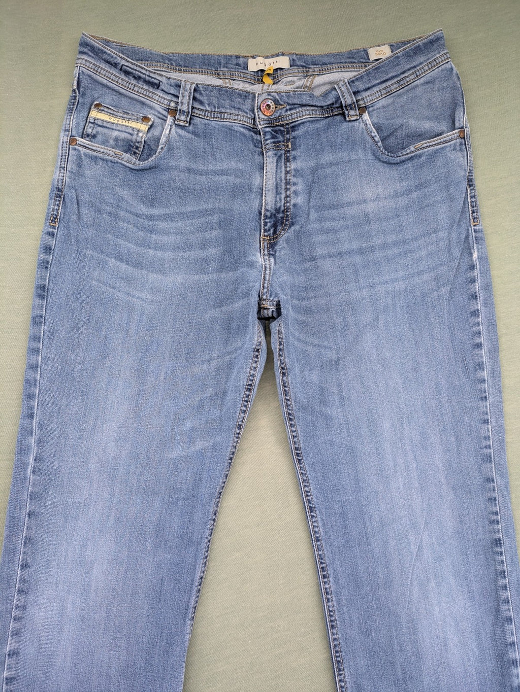 Bugatti blue straight jeans with classic 5-pocket design and light wash denim.