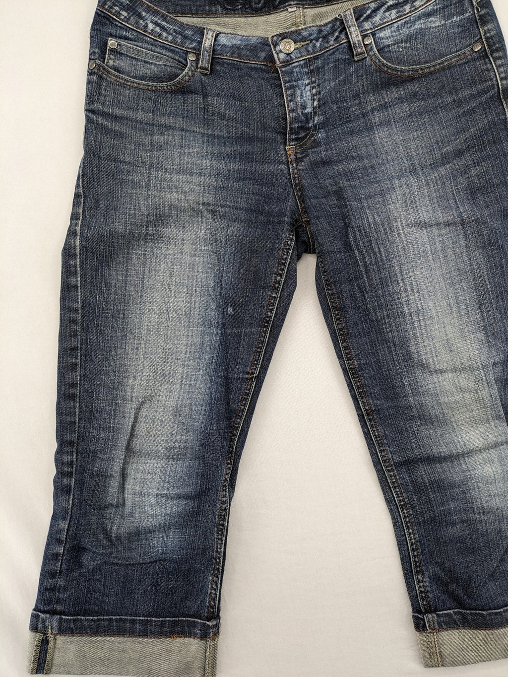 BLU blue straight jeans with washed effect, rolled hem, and five-pocket design.