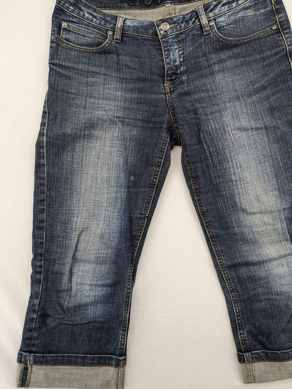 BLU blue straight jeans with washed effect, rolled hem, and five-pocket design.