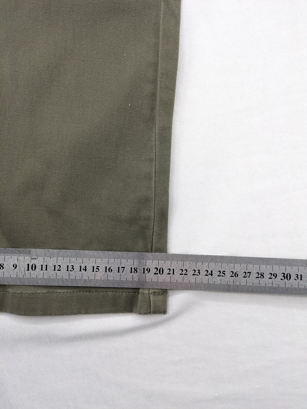 Man's World khaki chino pants with button and zipper closure, made from cotton-elastane blend.