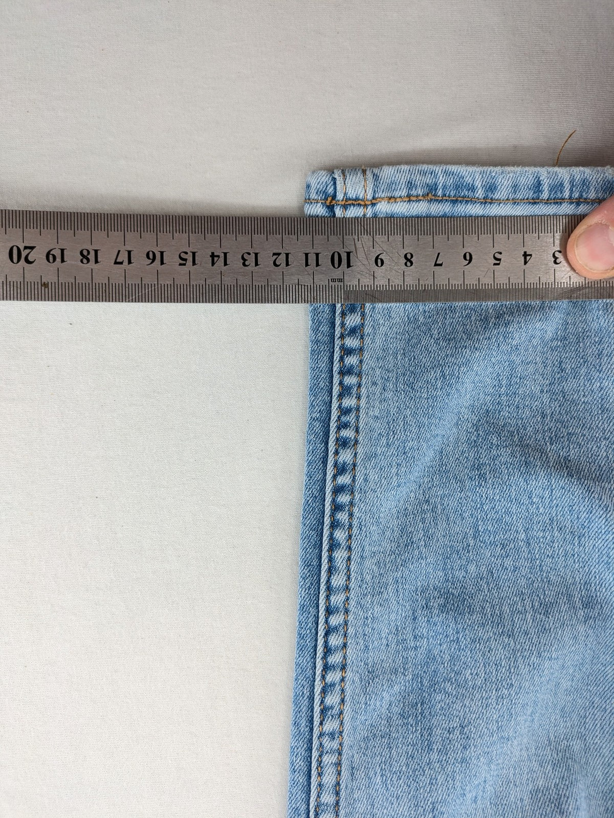 Bershka blue super high waist skinny jeans with washed denim finish and zip closure.