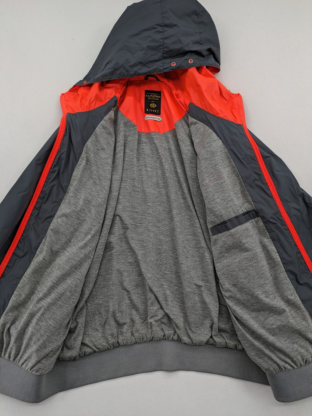 Cars Jeans windbreaker jacket grey orange color block design with logo on chest.