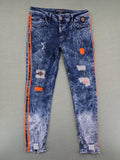 Stark straight jeans multi distressed acid wash with orange patches and side stripes.