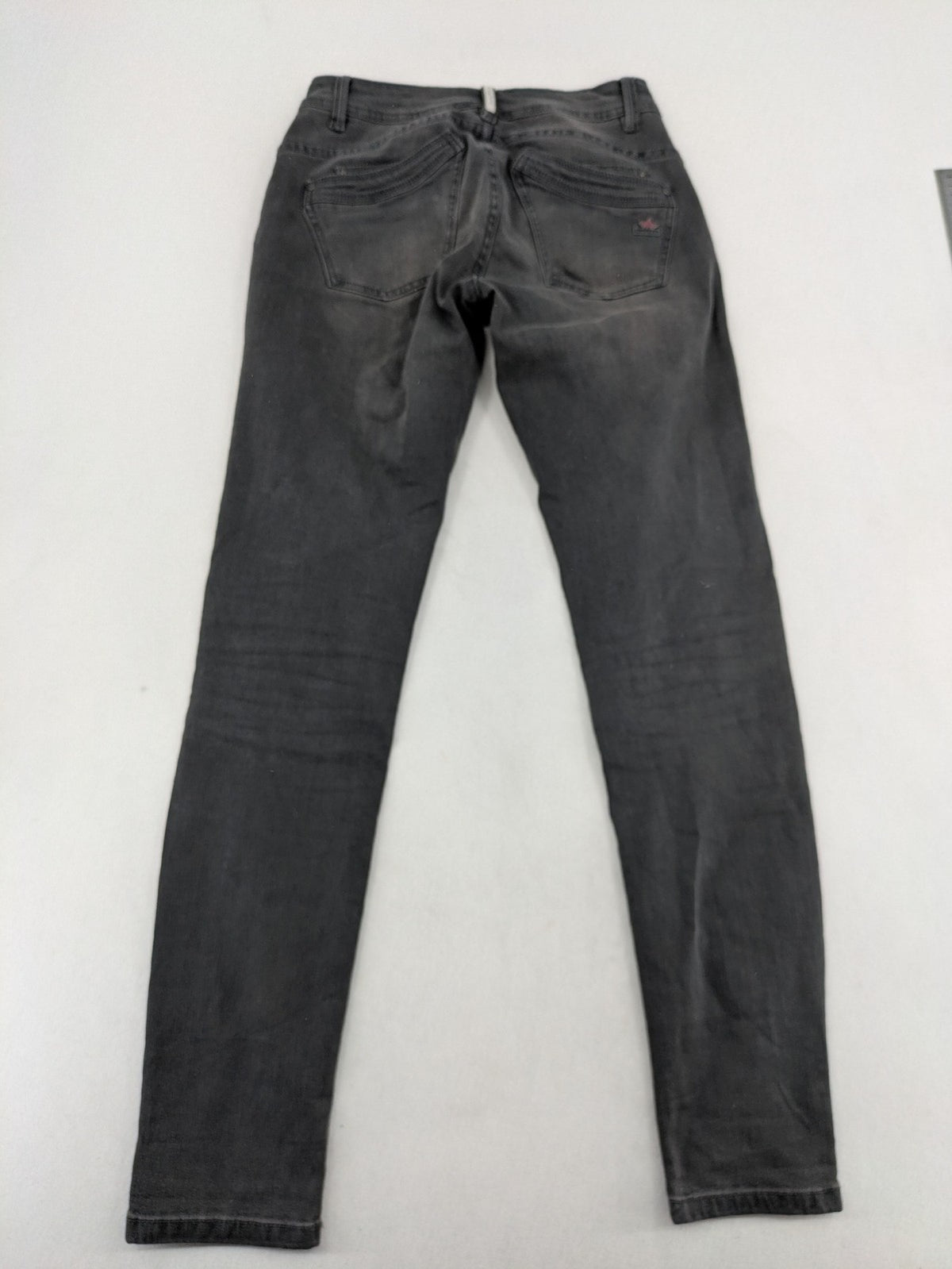 Buena Vista grey skinny jeans with button fly and stretch denim material.