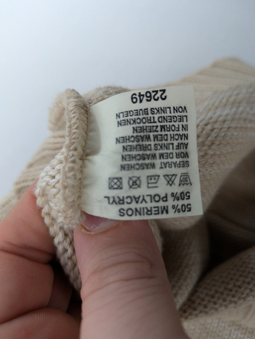 Pencini beige turtle neck jumper, sleeveless design, soft merino wool blend.