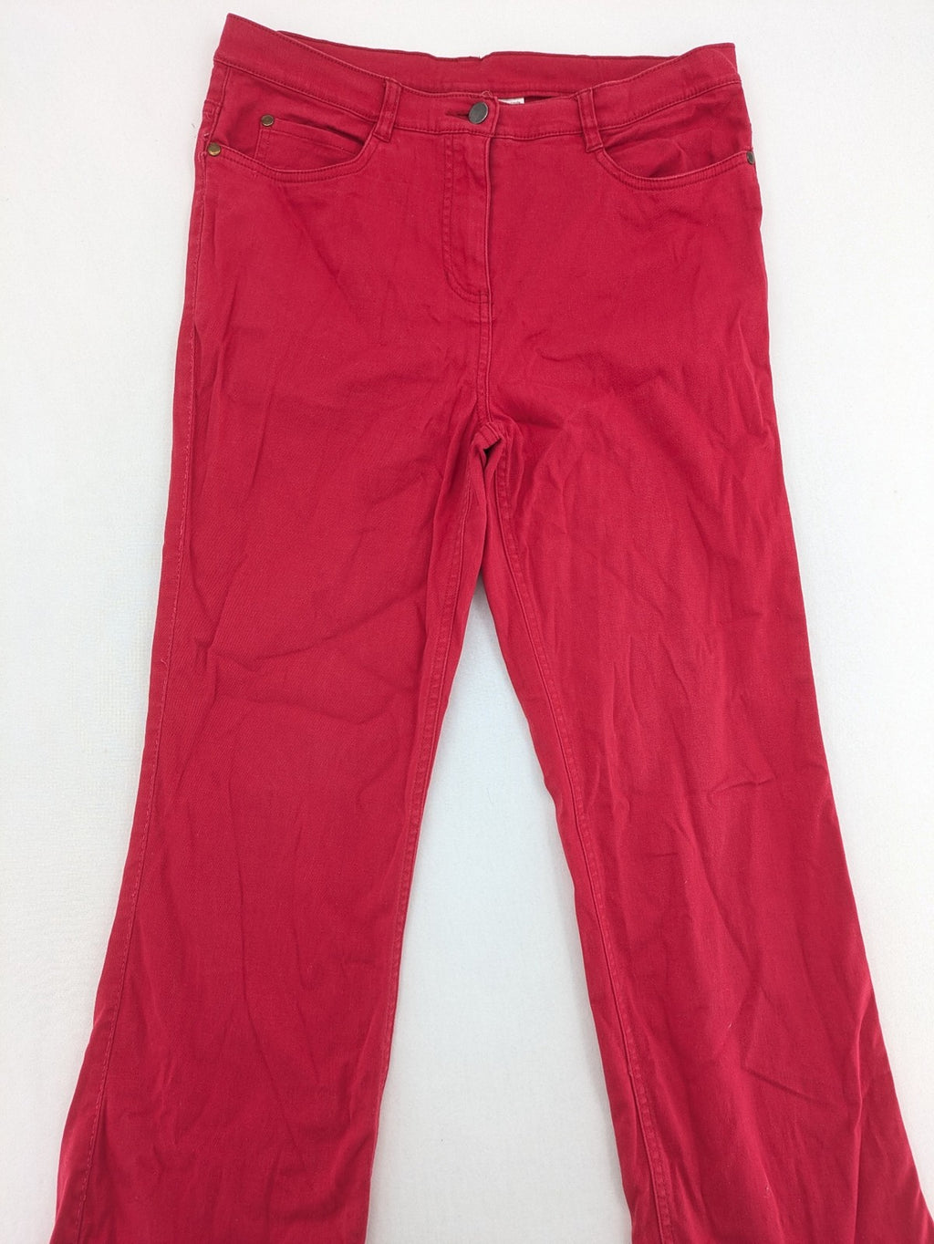 Jet Line red bootcut jeans with embroidered back pockets and pearl embellishments.