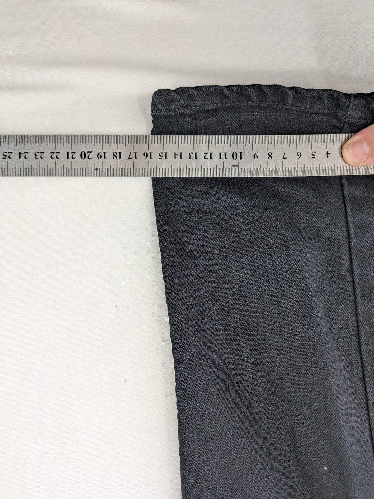 Levi's black slim fit jeans with classic 5-pocket design and zipper fly.