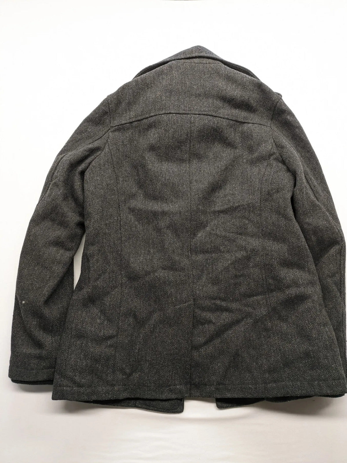 Jack & Jones grey coat herringbone pattern with two-button closure and side pockets.