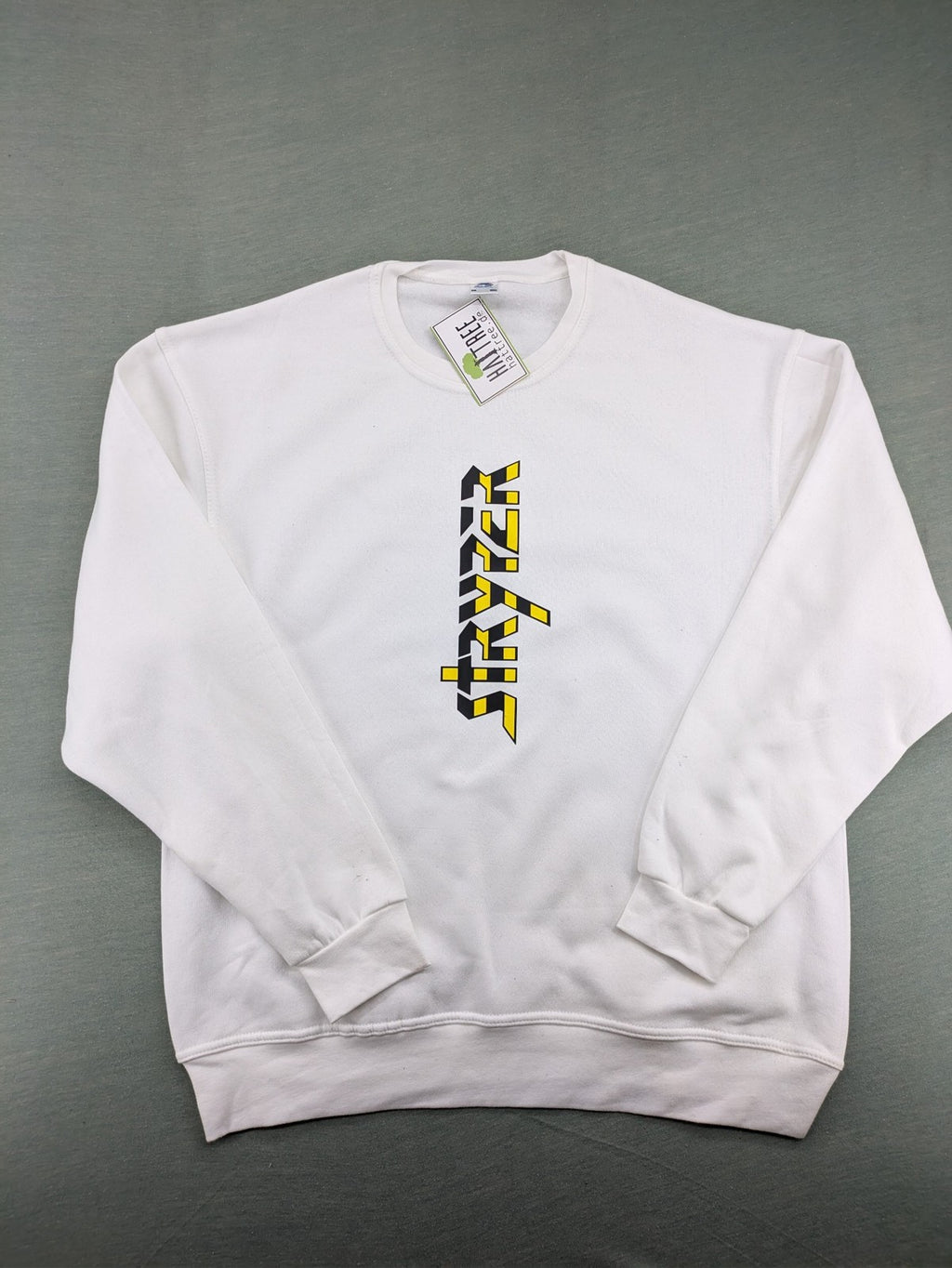 Stryper turtle neck jumper black with yellow vertical logo graphic on chest.