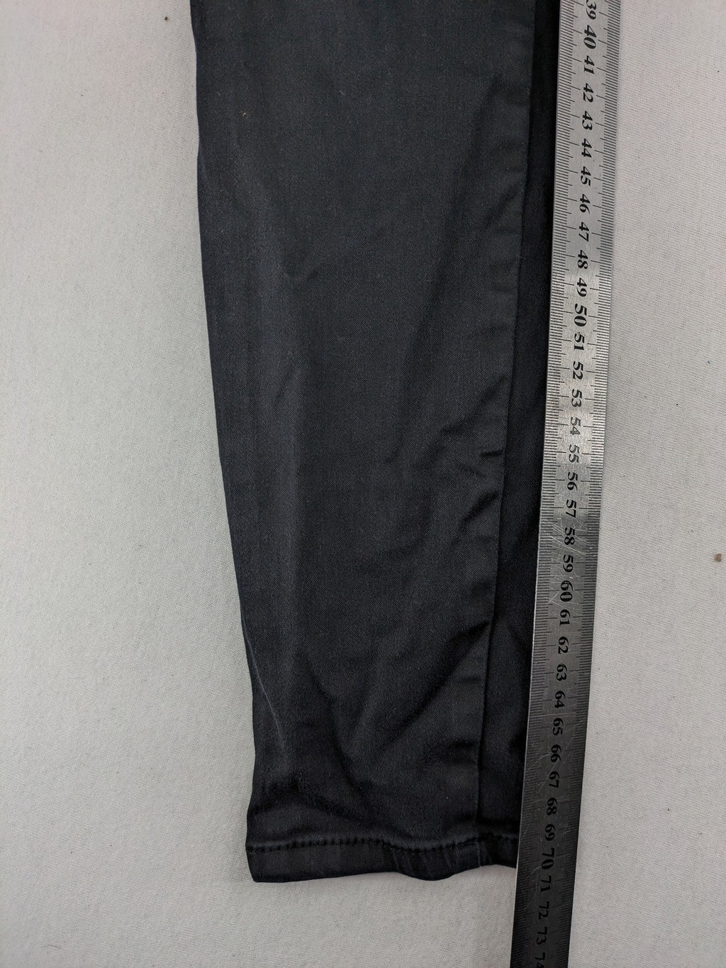 Massimo Dutti grey skinny fit jeans with coated finish and sleek silhouette.