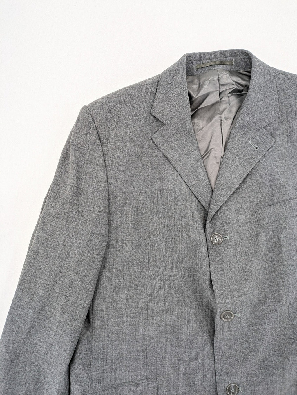Montego grey blazer three-button design made from wool blend with smooth lining.