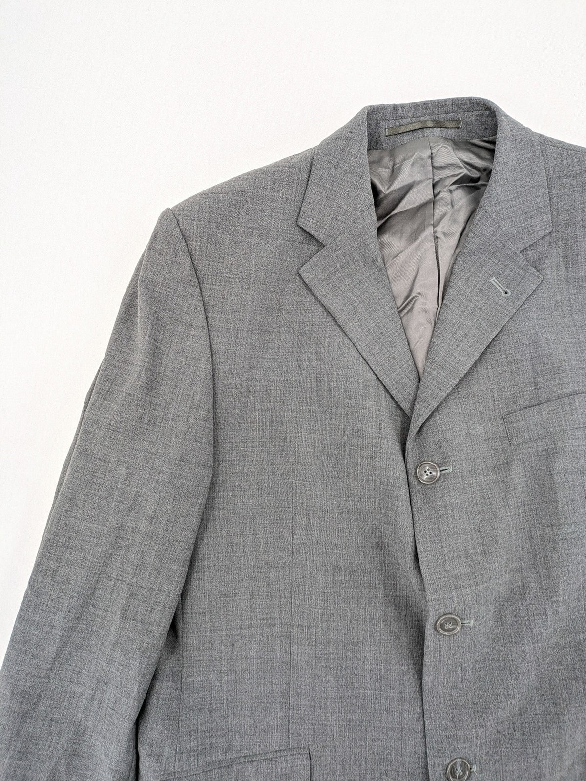 Montego grey blazer three-button design made from wool blend with smooth lining.