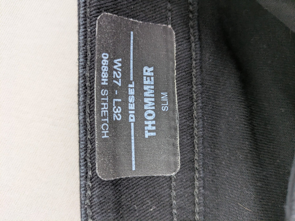 Diesel black Thommer Slim jeans with classic 5-pocket design and stretch material.