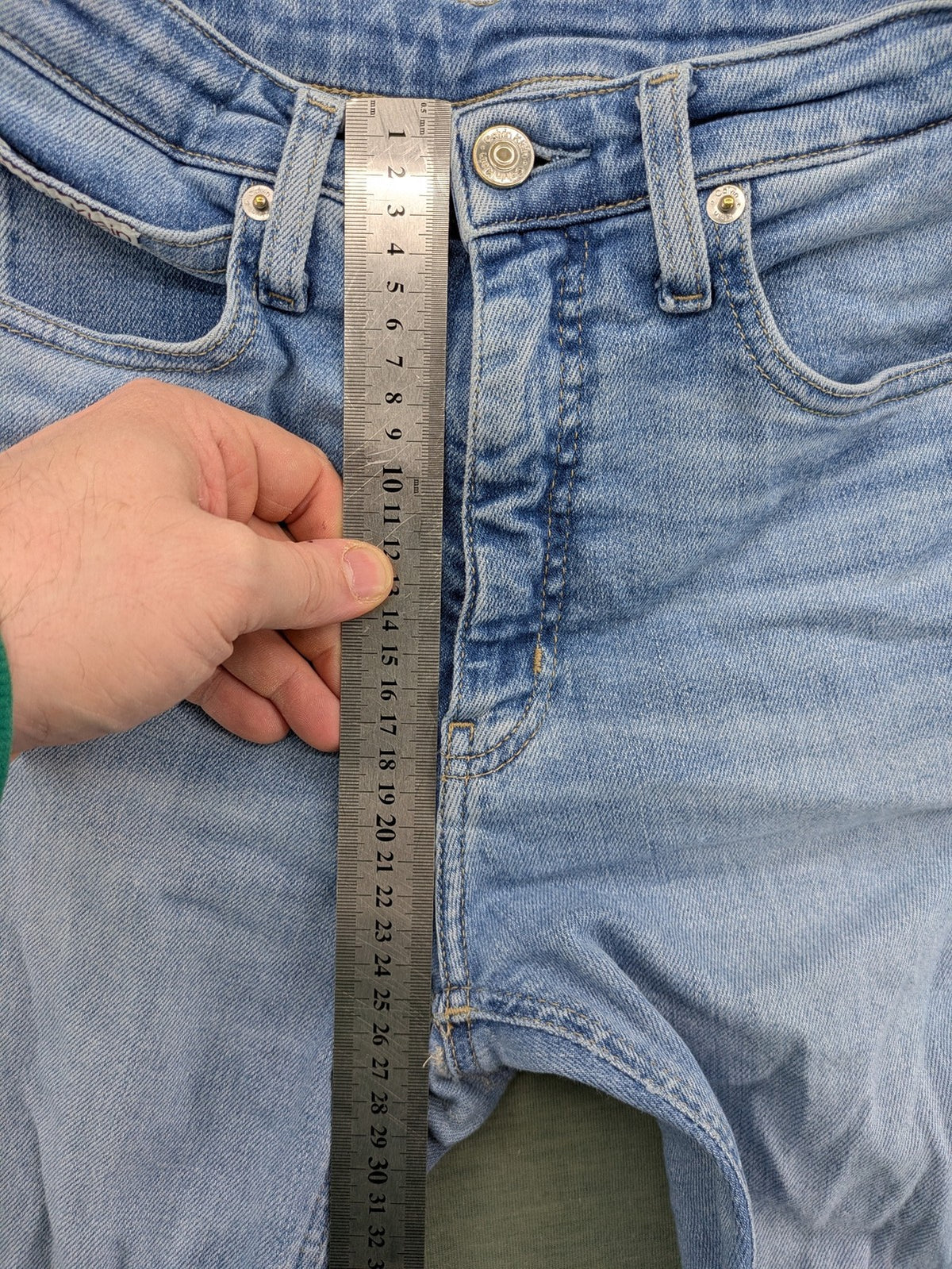 Calvin Klein Jeans blue high rise super skinny ankle jeans with logo patch and stretch material.