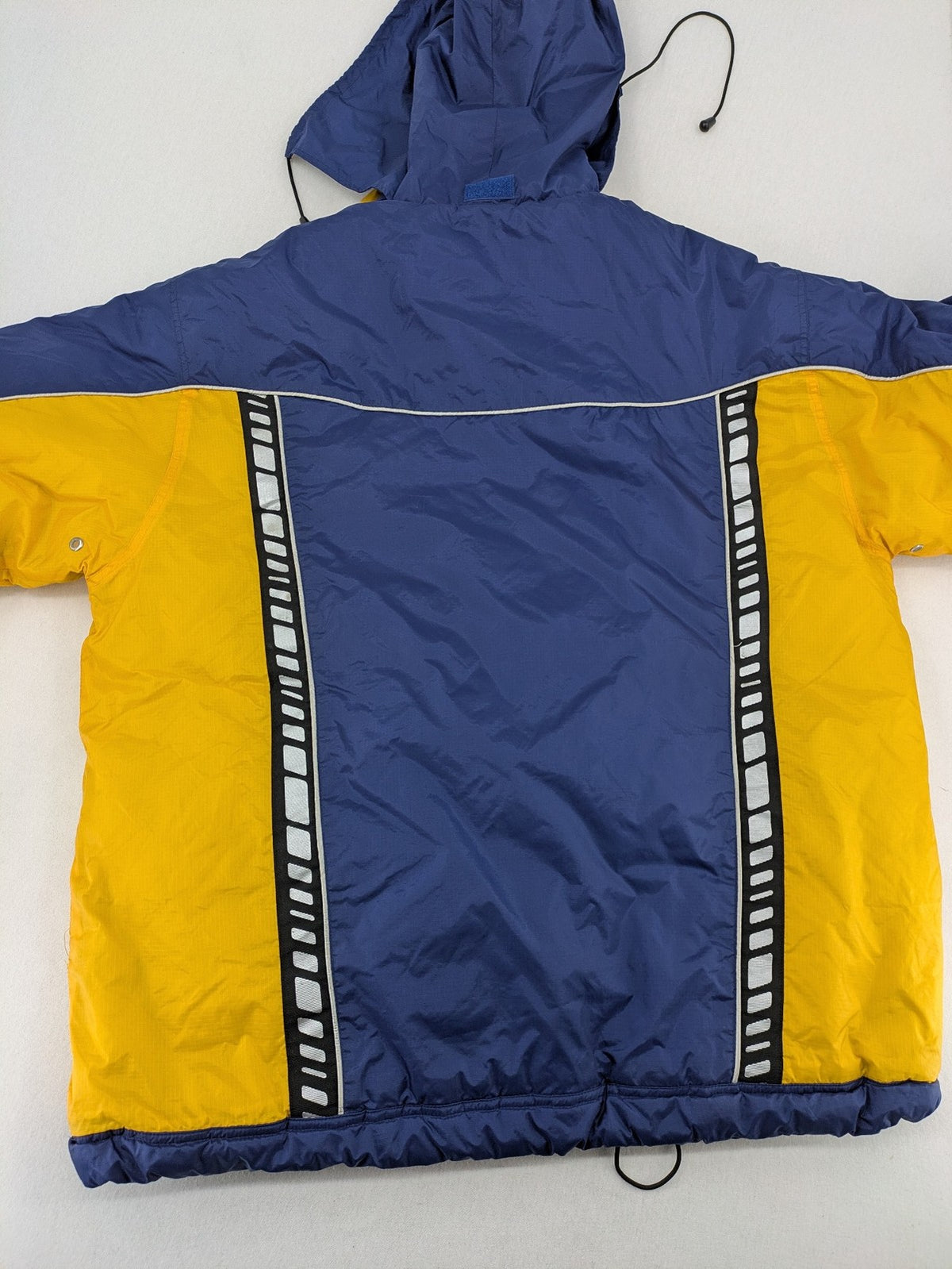Shamp navy and yellow vintage ski jacket and pants set with retro design.