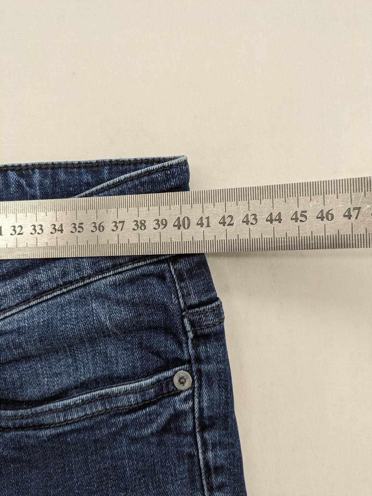 Clockhouse blue skinny fit jeans with stretch material and subtle logo detail.