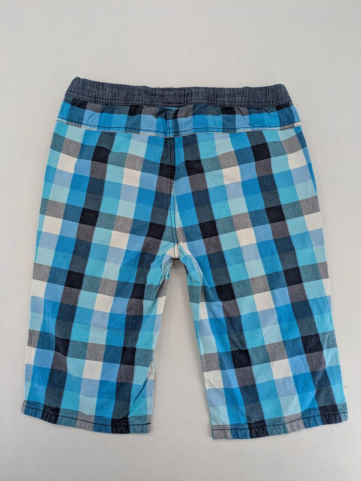 C&A blue checkered shorts with elastic waistband and side pockets, Skate Nation style.