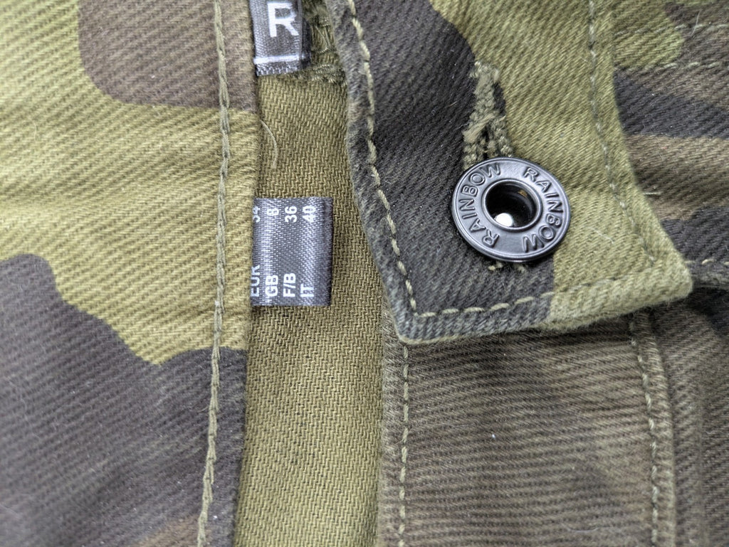 Rainbow camouflage cargo pants in green-brown with jogger silhouette and multiple pockets.