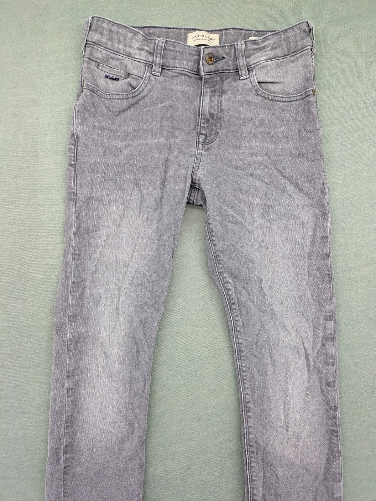 Scotch & Soda grey straight jeans with classic five-pocket design and logo patch.
