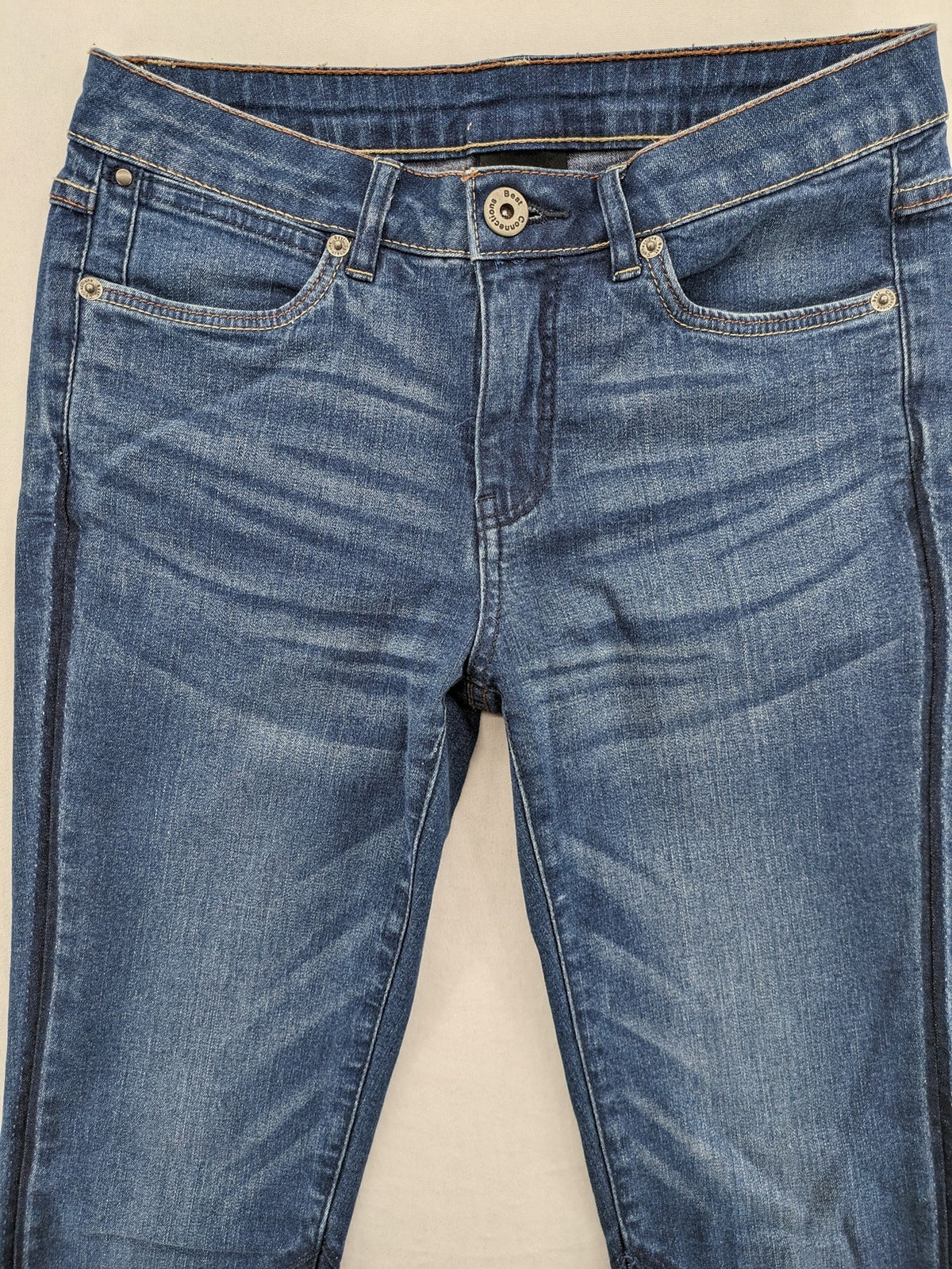 Best Connections blue skinny jeans with frayed hem and sporty side stripe.