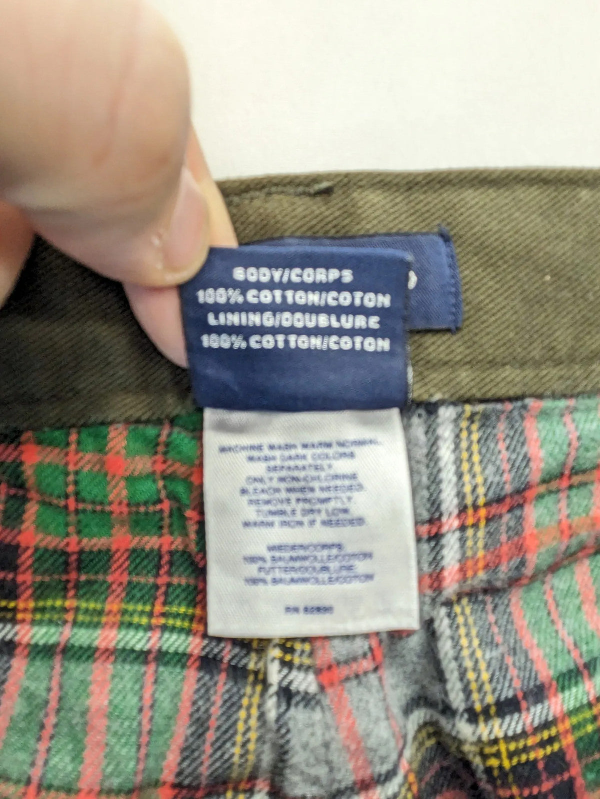 Lands' End green cargo pants with plaid flannel lining and traditional fit design.