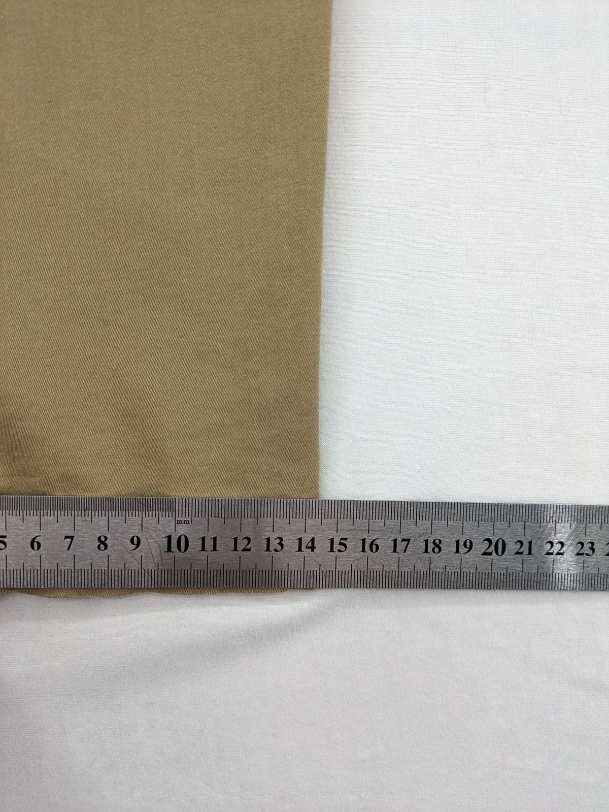 Zara khaki pants with elastic waistband, made from stretch cotton blend for comfort.