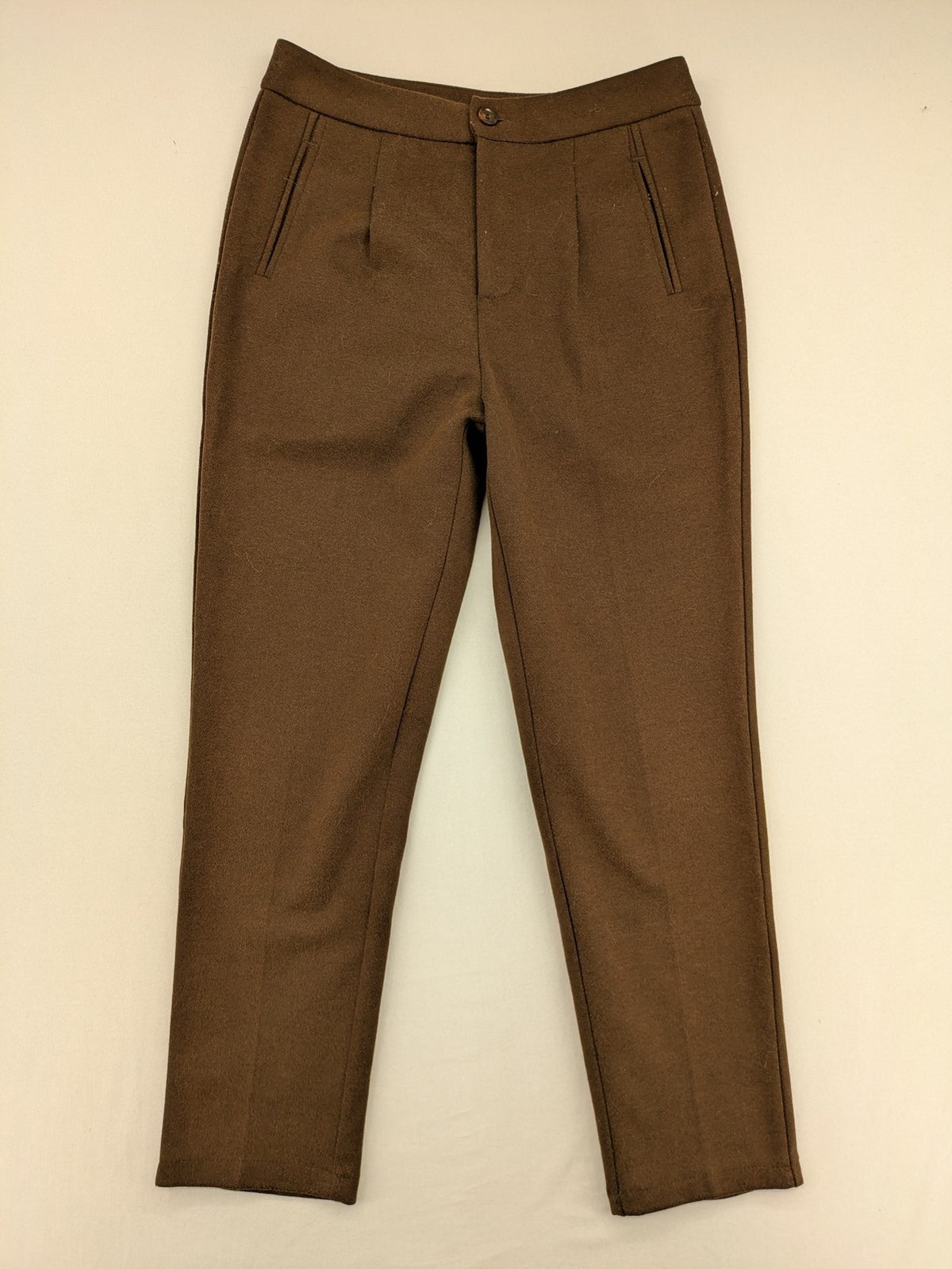 Liuliu pink high waist pants with pleats, side pockets, and classic design.