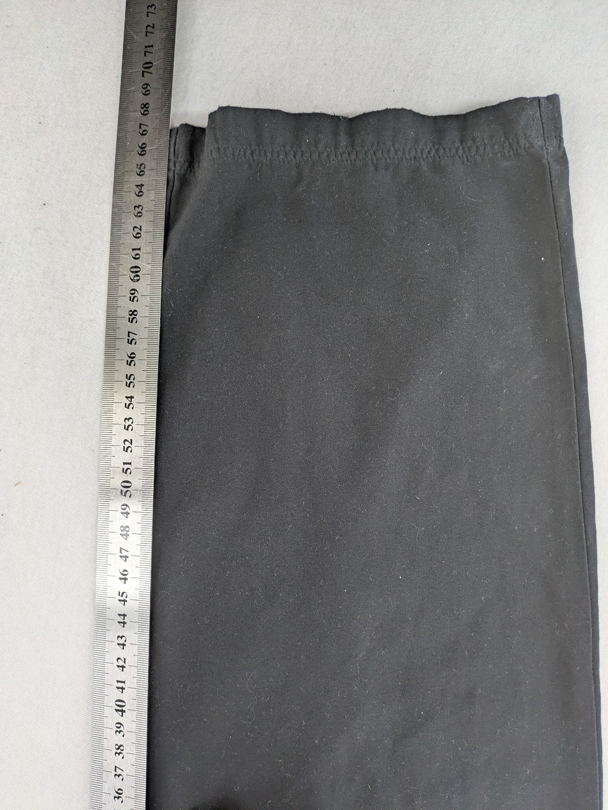 Slazenger grey loungewear joggers with adjustable drawstring and subtle logo on thigh.