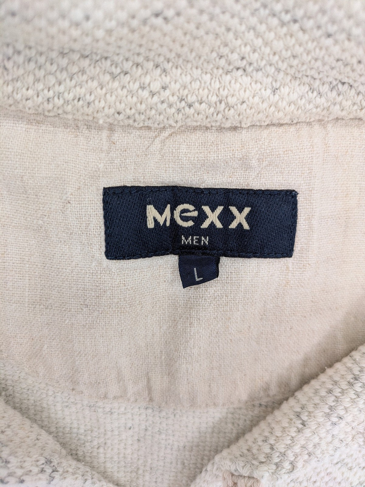 Mexx grey polo shirt with textured fabric and two-button placket.